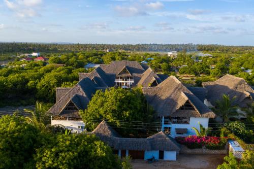 an aerial view of a house with a roof at Rafiki Village in Watamu