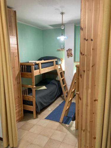 Postel nebo postele na pokoji v ubytování Lo Squero
