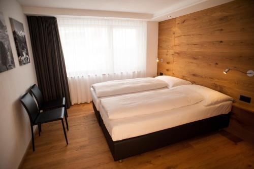 Postel nebo postele na pokoji v ubytování Serviced Apartment ELITE