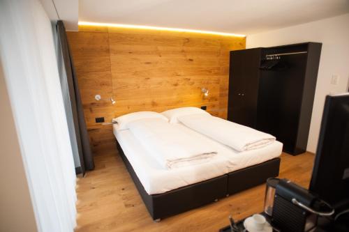Postel nebo postele na pokoji v ubytování Serviced Apartment ELITE