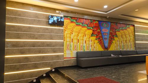 TV a/nebo společenská místnost v ubytování HOTEL DIVINE RAMESHWARAM