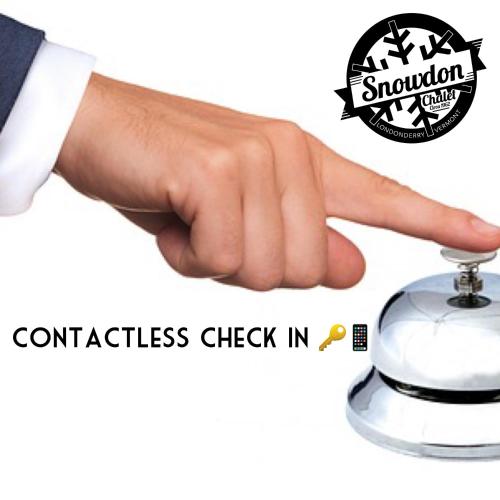 a hand next to a glass suggestion box at Snowdon Chalet Motel in Londonderry