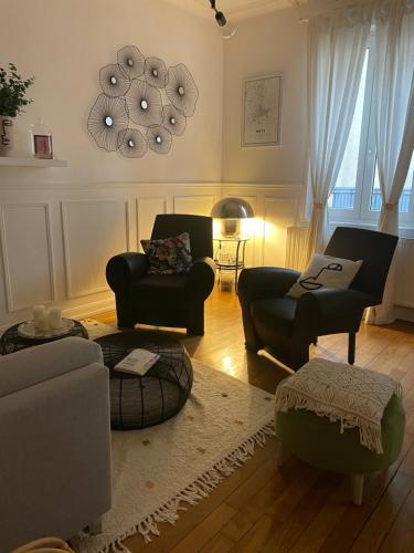 Ein Sitzbereich in der Unterkunft Chez Tess