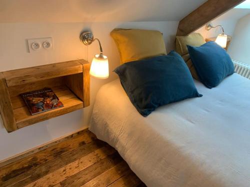 Llit o llits en una habitació de Maison de rêve en plein coeur de Paimpol