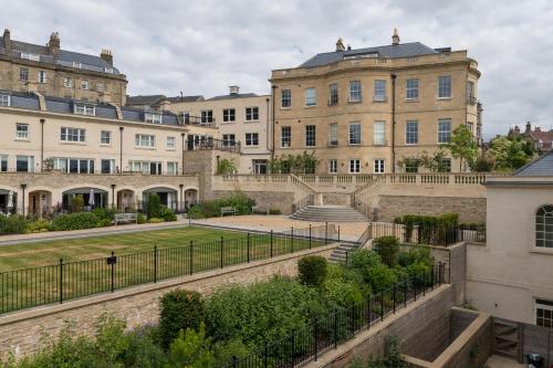 a group of buildings with stairs in front of them at Bath Penthouse with amazing views and lift access in Bath
