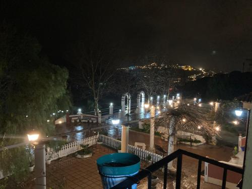 a view of a city at night with lights at Complejo turístico Fuente de la Salud in Baena