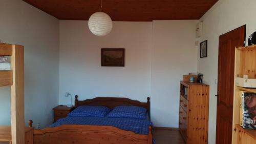 Postel nebo postele na pokoji v ubytování Apartmán nad Teplou Vltavou