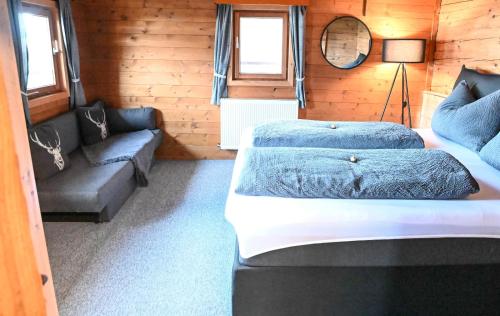 Una cama o camas en una habitación de Haus Prantl