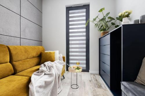 Posezení v ubytování Apartamenty Olimpijska nad jeziorem Ukiel