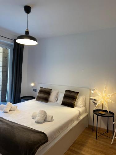 Кровать или кровати в номере Apartamento Premium en Ribasol Ski & Mountain Park