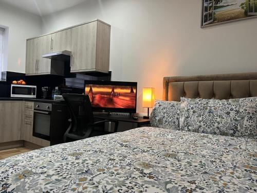 Dapur atau dapur kecil di Belvue Serviced Apartment - Ealing Broadway