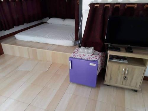 Katil atau katil-katil dalam bilik di Khum Charoen Homestay