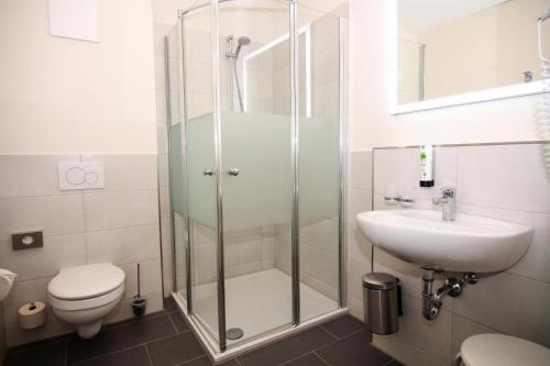 Ένα μπάνιο στο Appartements im Avalon Hotel Bellevue, Fehmarn