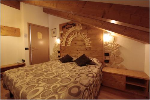 Ένα ή περισσότερα κρεβάτια σε δωμάτιο στο Maso La Vecchia Quercia