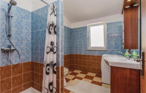 a bathroom with a shower and a sink at Nice Apartment In Kastel With Kitchen in Kaštel