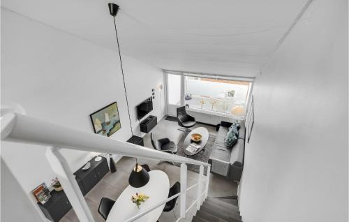 an overhead view of a living room with a staircase at Feriecenter Klinten in Faaborg