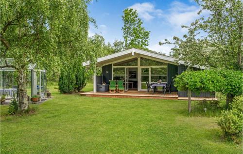 Κήπος έξω από το Three-Bedroom Holiday Home In Humble