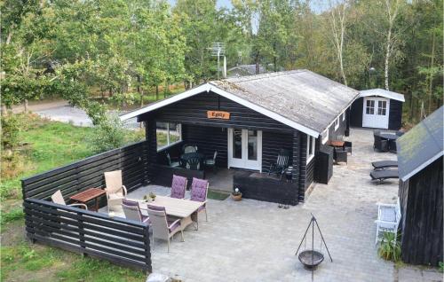 an overhead view of a cabin with chairs and tables at Two-Bedroom Holiday Home In Ansager in Ansager
