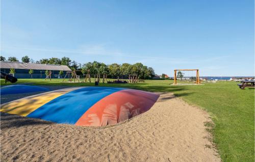 a playground with a painting on the side of a park at Pet Friendly Home In Tranekær With Wifi in Tranekær