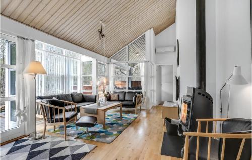 Khu vực ghế ngồi tại Rubinsøen Skovhuse