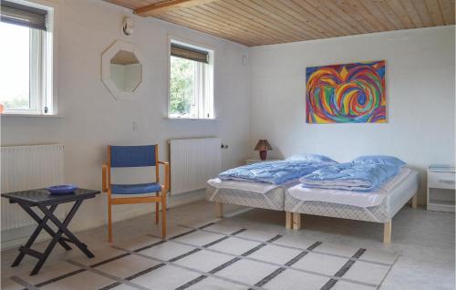 Postel nebo postele na pokoji v ubytování Holiday Home Ringkobing Ii