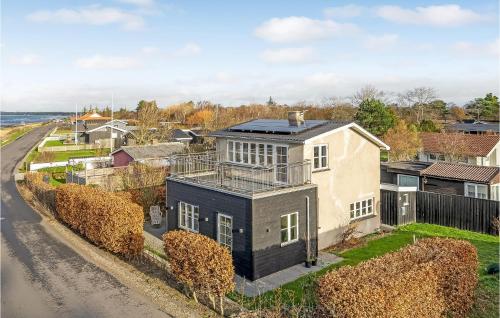 an aerial view of a house with a balcony at One-Bedroom Holiday Home In Slagelse in Slagelse