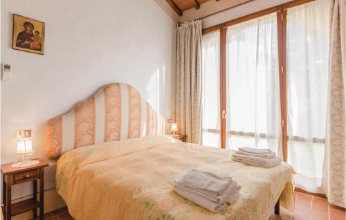 Кровать или кровати в номере Il Marinocchio Di Malatesti