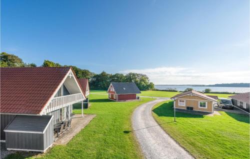 arial view of a farm with houses and a road at Lovely Home In Gråsten With Wifi in Gråsten