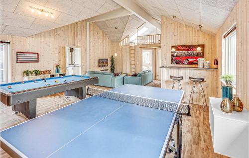 a ping pong room with a ping pong table at Nice Home In Bogense With Sauna in Skåstrup