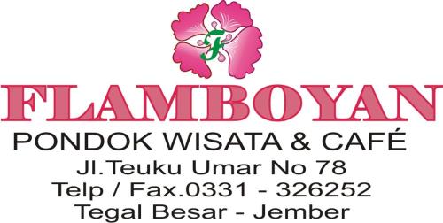 a sign for a restaurant with a pink flower at Hotel Flamboyan in Jember