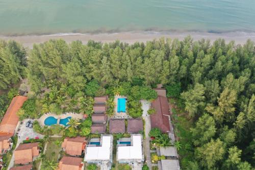 an aerial view of a house with trees and the beach at Cousin Resort Koh Kho Khao Beach in Ko Kho Khao