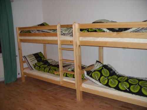 a couple of bunk beds in a room at Hostel Sosnowiec in Sosnowiec