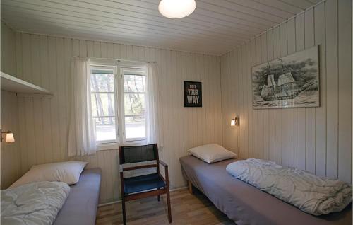 Posteľ alebo postele v izbe v ubytovaní Dueodde Ferieby