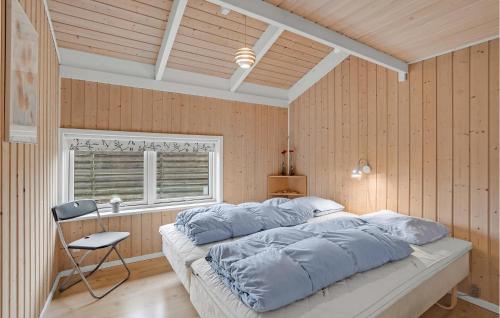 Postel nebo postele na pokoji v ubytování Stunning Home In Dannemare With Wifi