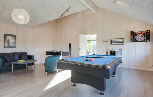 a living room with a pool table in it at Seven-Bedroom Holiday Home In Frederiksvark in Frederiksværk