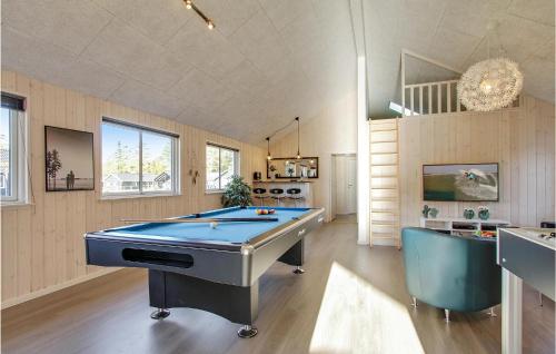 a billiard room with a pool table and a couch at Seven-Bedroom Holiday Home In Frederiksvark in Frederiksværk