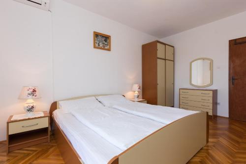 Ένα ή περισσότερα κρεβάτια σε δωμάτιο στο Guest House Oreb