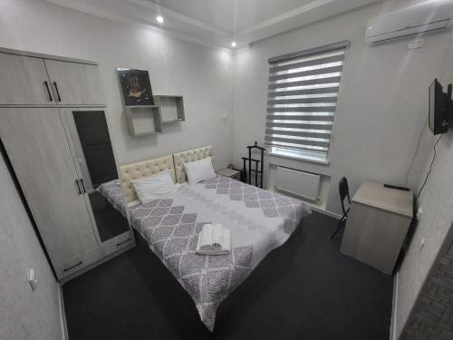 Postel nebo postele na pokoji v ubytování Shahriston Guest House
