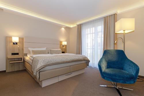 Postel nebo postele na pokoji v ubytování HOTEL am STRAND
