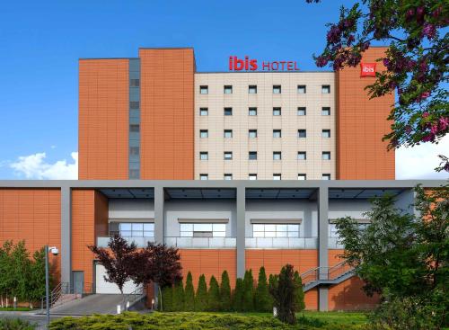 a building with aubs hotel on top of it at ibis Ankara Airport Hotel in Ankara