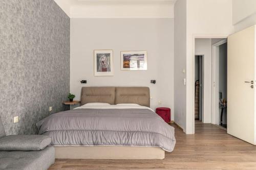 Posteľ alebo postele v izbe v ubytovaní Apt w/ View of OlympusZeusTemple/4BEDR-3BATH-2KITC