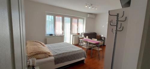 Postel nebo postele na pokoji v ubytování La Siesta Bogács Apartman