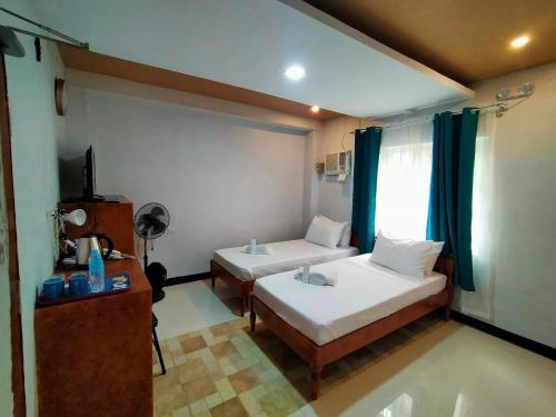 Katil atau katil-katil dalam bilik di JPrime Traveller's Lodge