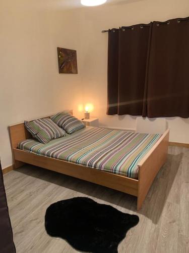 Posteľ alebo postele v izbe v ubytovaní Charmant appartement 2 chambres dans le centre historique