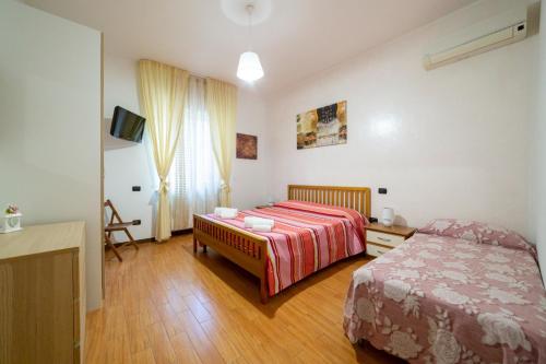 Ένα ή περισσότερα κρεβάτια σε δωμάτιο στο Casa Massa