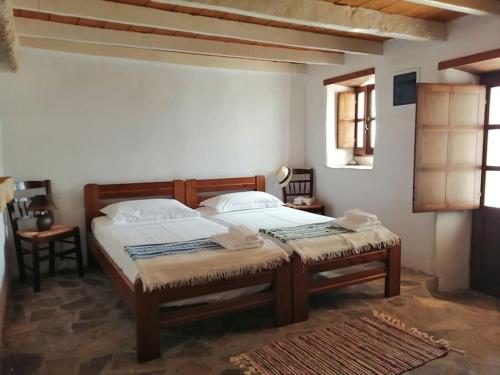 Postel nebo postele na pokoji v ubytování Looby's at Christos Leros