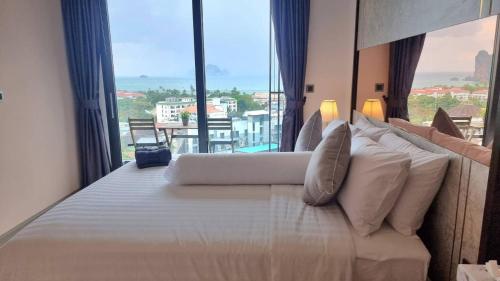 Postel nebo postele na pokoji v ubytování B401-Paradise Sea View 2 Brs2baths Center Ao Nang