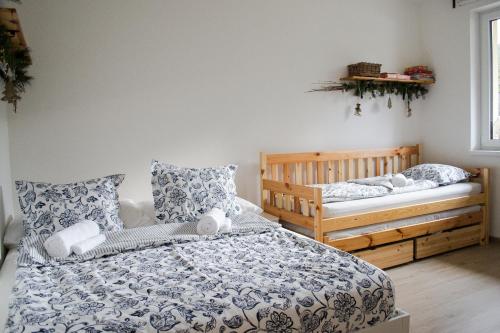 Postel nebo postele na pokoji v ubytování Donovaly Alonia