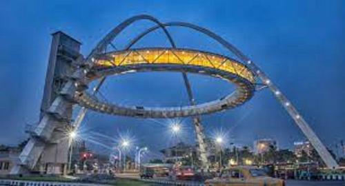a roller coaster in a park at night at YWCA GALLWAY GUEST HOUSE in Kolkata