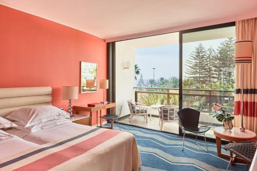 Letto o letti in una camera di Seaside Palm Beach